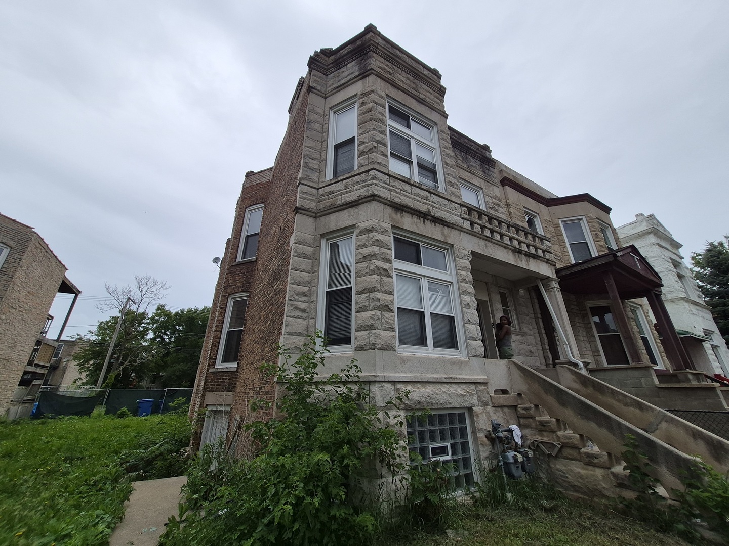 4126 West Adams Street Chicago, IL 60624 - Photo 1 of 19 a large building with a clock on it