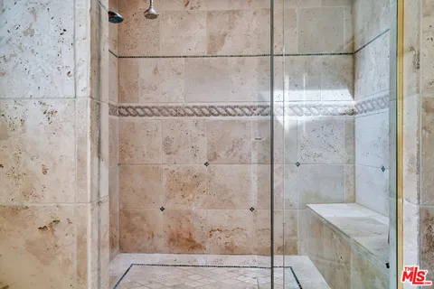 a view of a chairs and table in the patio