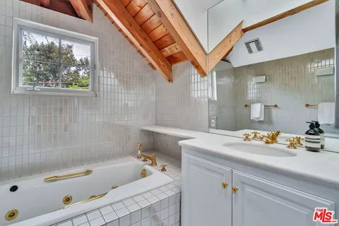 a house view with a garden space