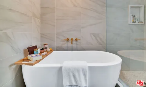 an aerial view of a house with a yard and garden