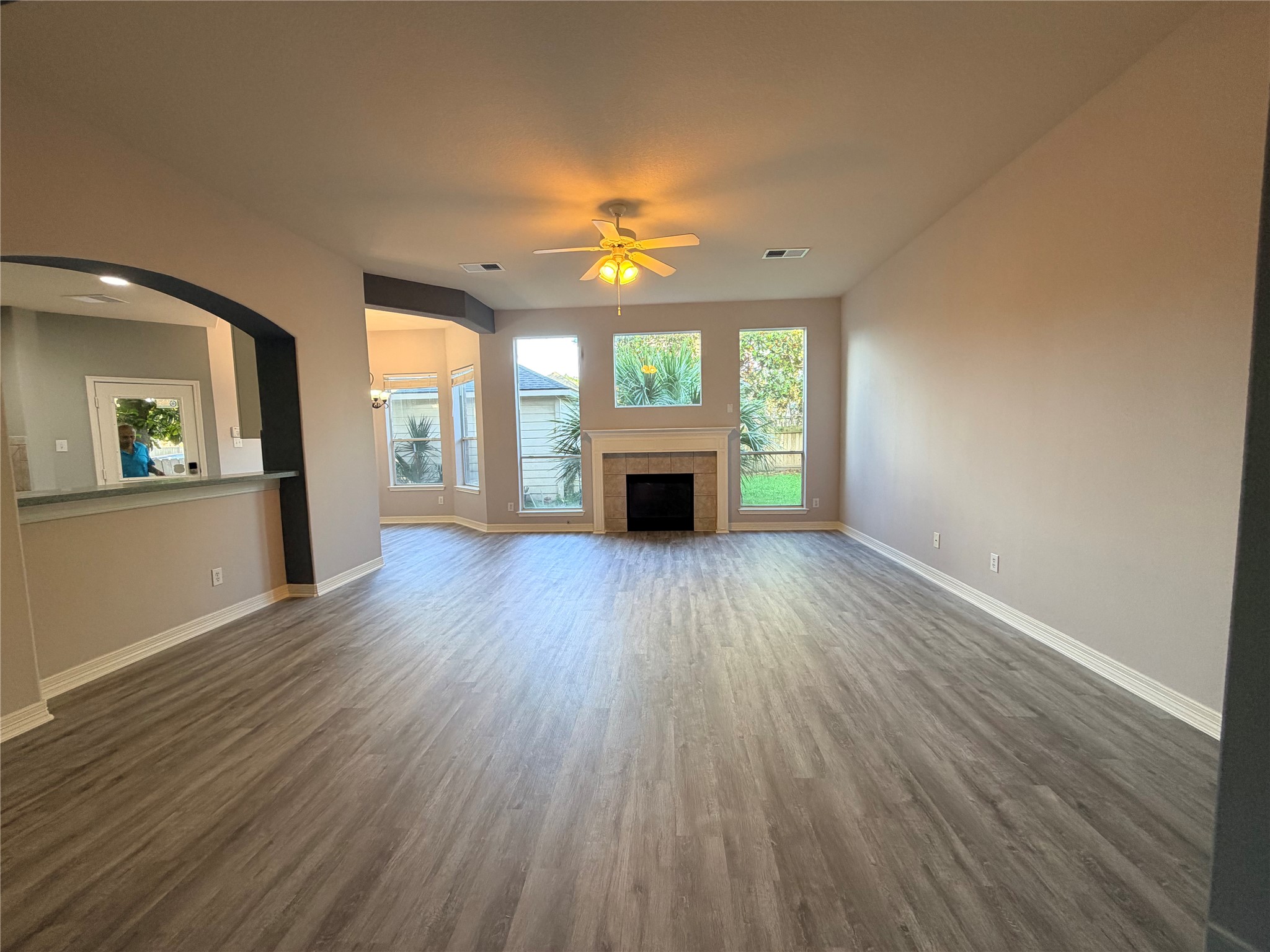 2303 Chelsea Ridge Court Katy, TX 77450 - Photo 8 of 12 wooden floor in an empty room with a window