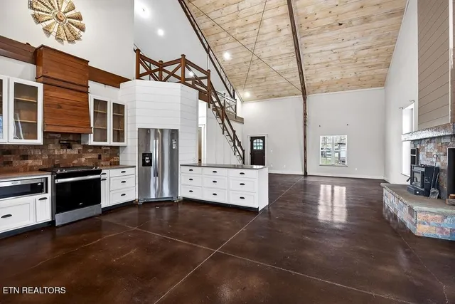 a room with cabinets and flat screen tv