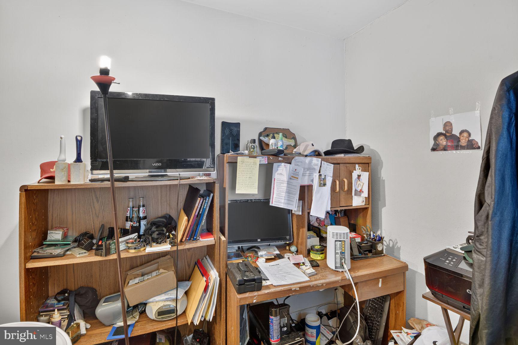 2015 Ray Leonard Road Landover, MD 20785 - Photo 10 of 15 Cluttered workspace brimming with life.