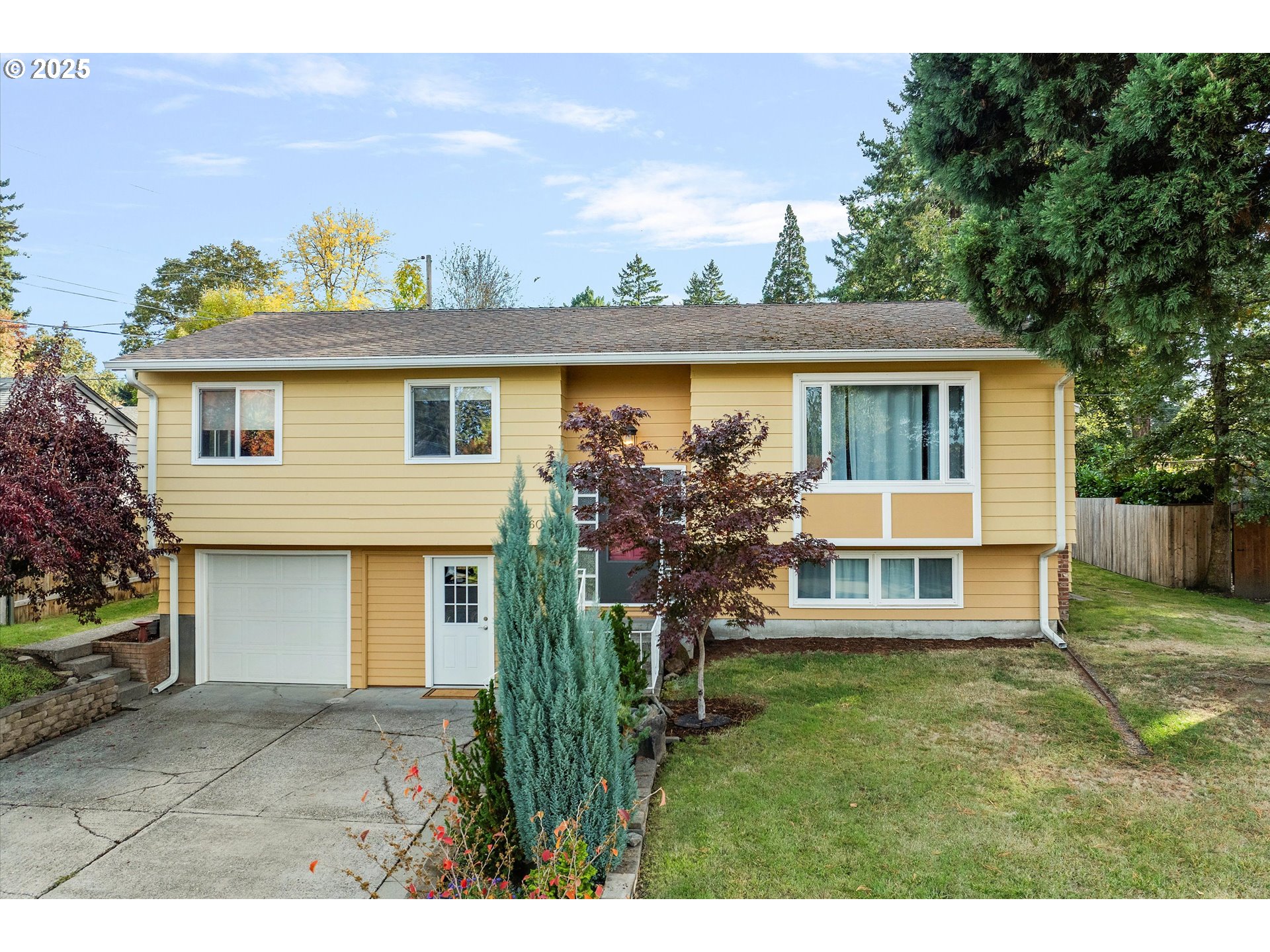1360 Northwest 130th Avenue Portland, OR 97229 - Photo 3 of 36 a view of a house with a yard