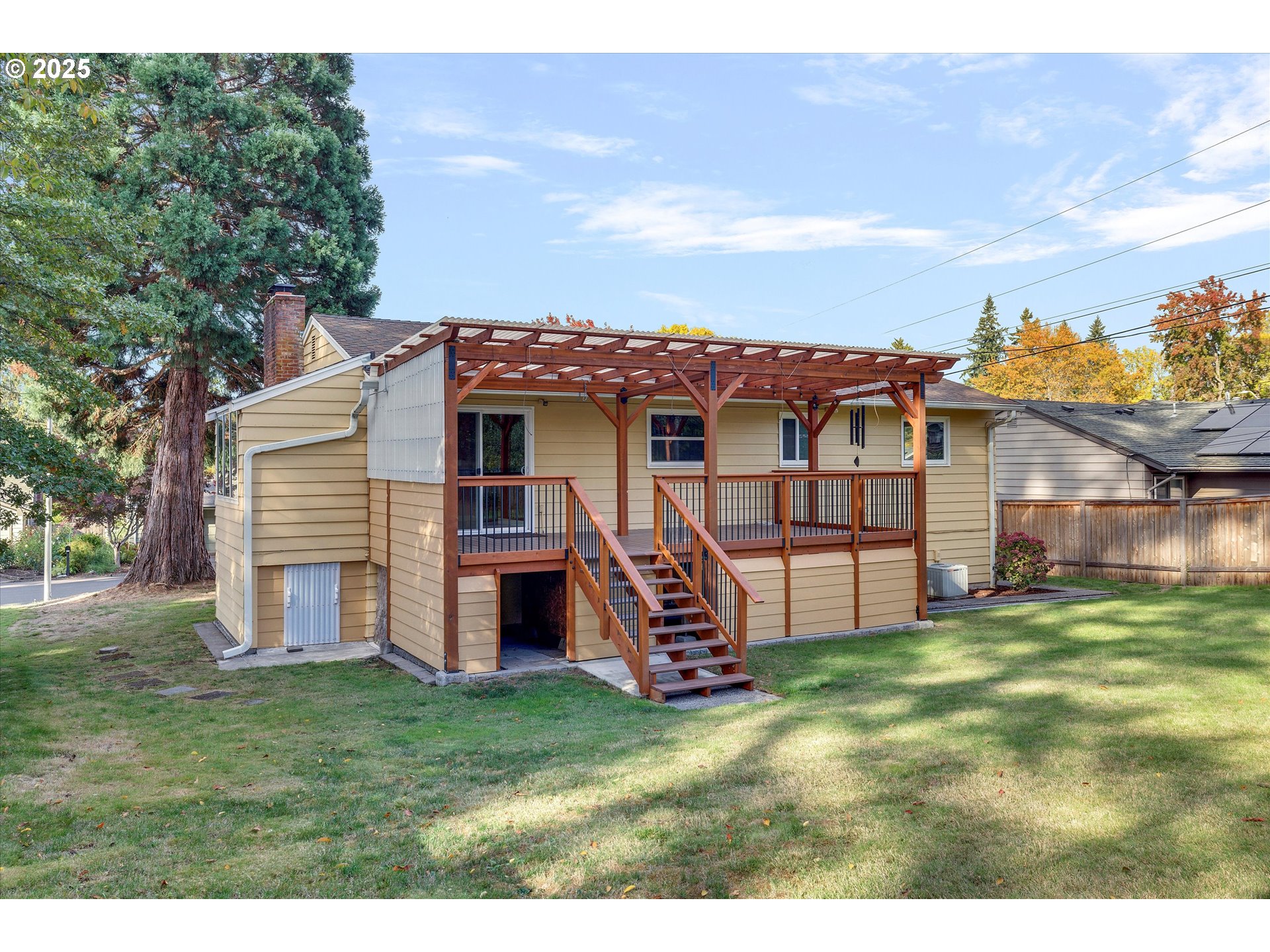 1360 Northwest 130th Avenue Portland, OR 97229 - Photo 35 of 36 a view of a house with a yard