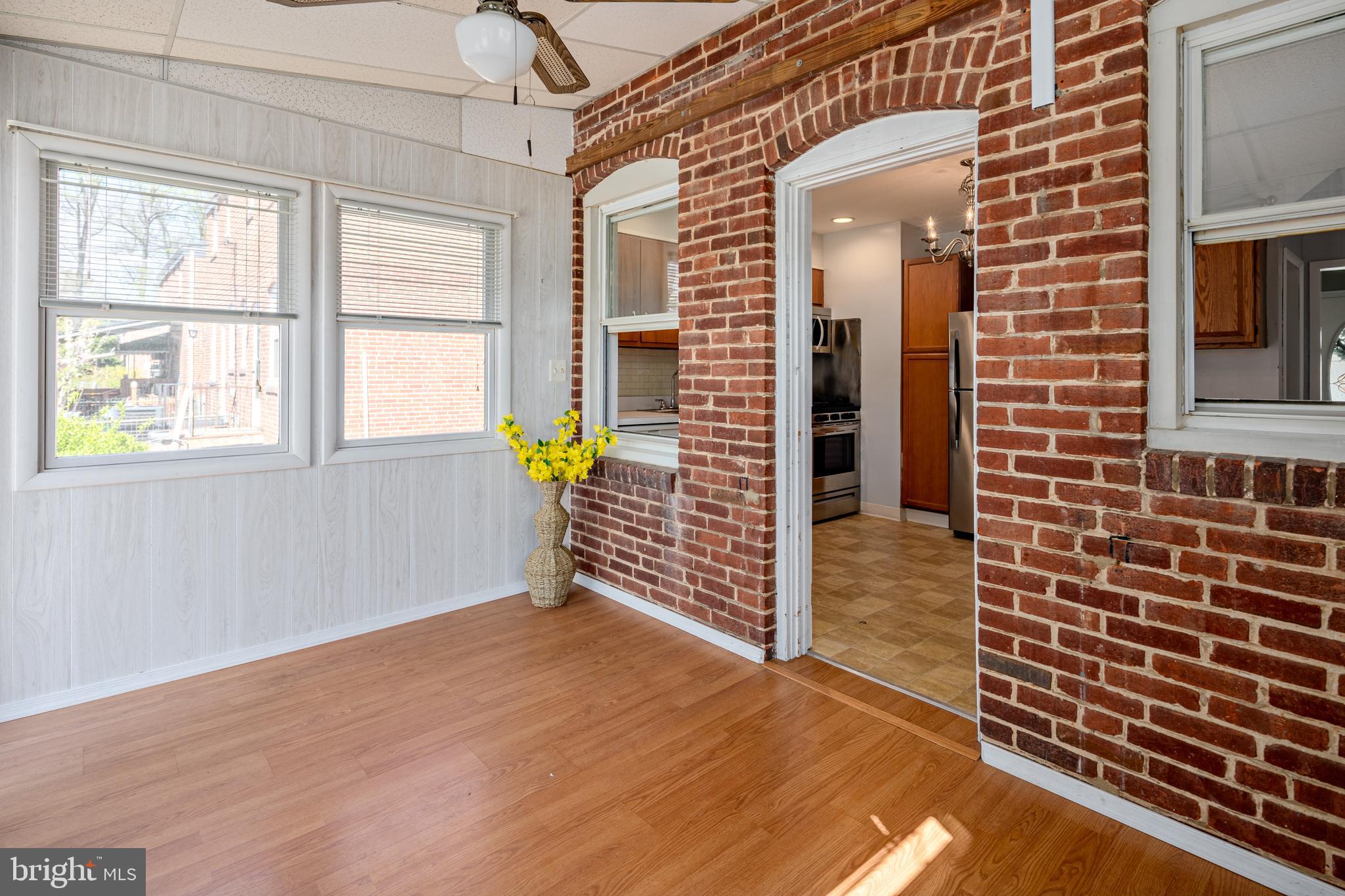 8546 Oakleigh Road Baltimore, MD 21234 - Photo 14 of 38 sunroom extends off the kitchen