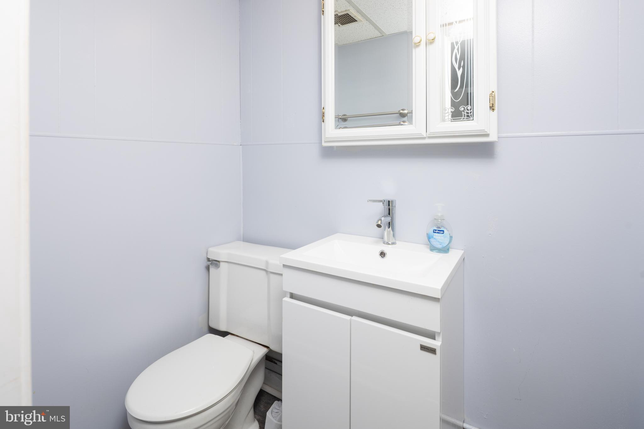 8546 Oakleigh Road Baltimore, MD 21234 - Photo 31 of 38 basement powder room 1/2 bath