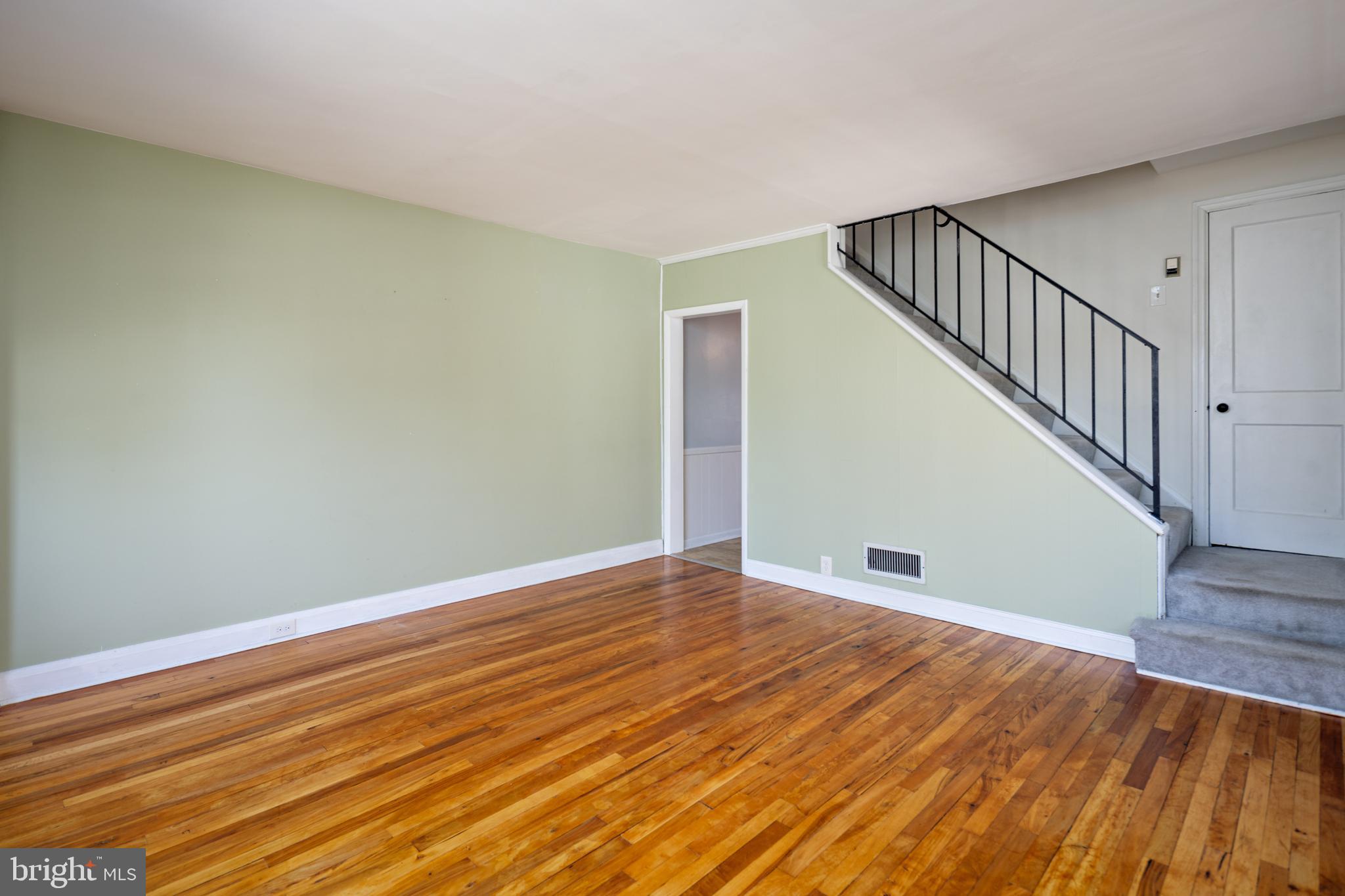 8546 Oakleigh Road Baltimore, MD 21234 - Photo 4 of 38 Open living room with hardwood floors