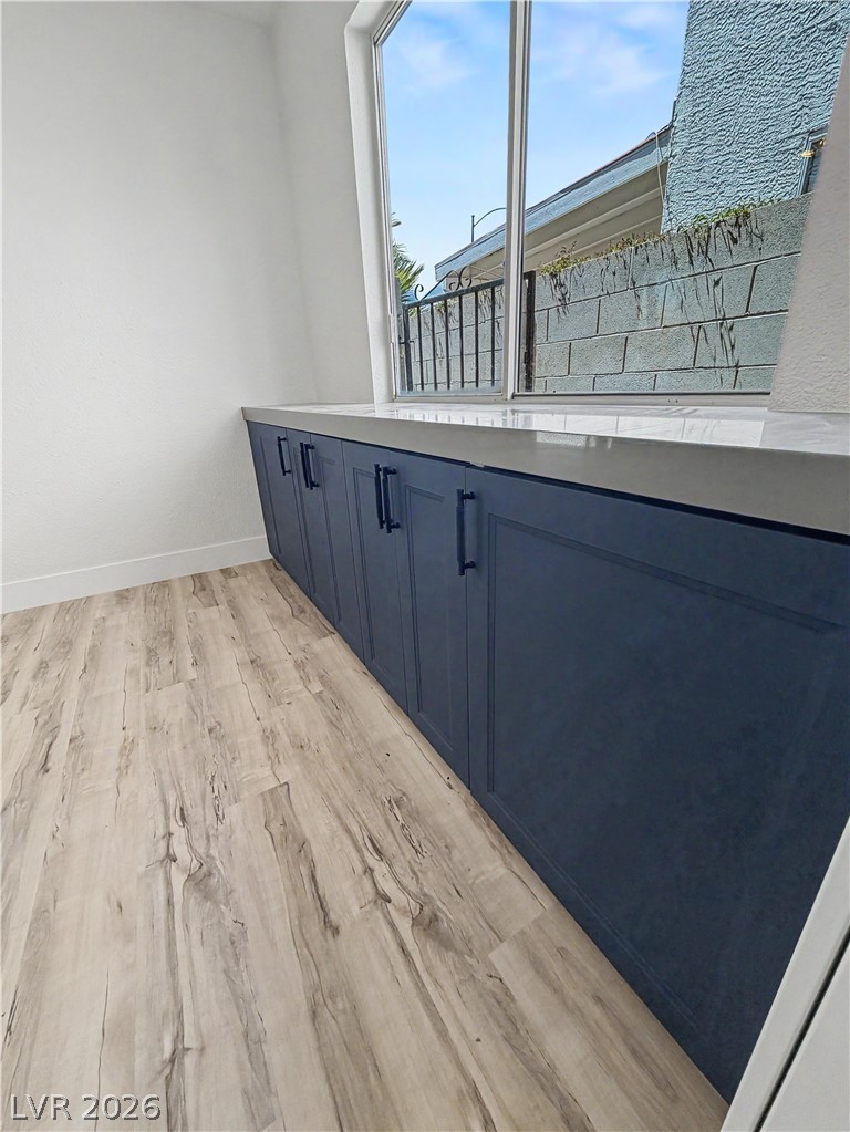 8977 Paige Rene Court Las Vegas, NV 89117 - Photo 14 of 31 Well-lit interior space with ample cabinetry and easy-care flooring.