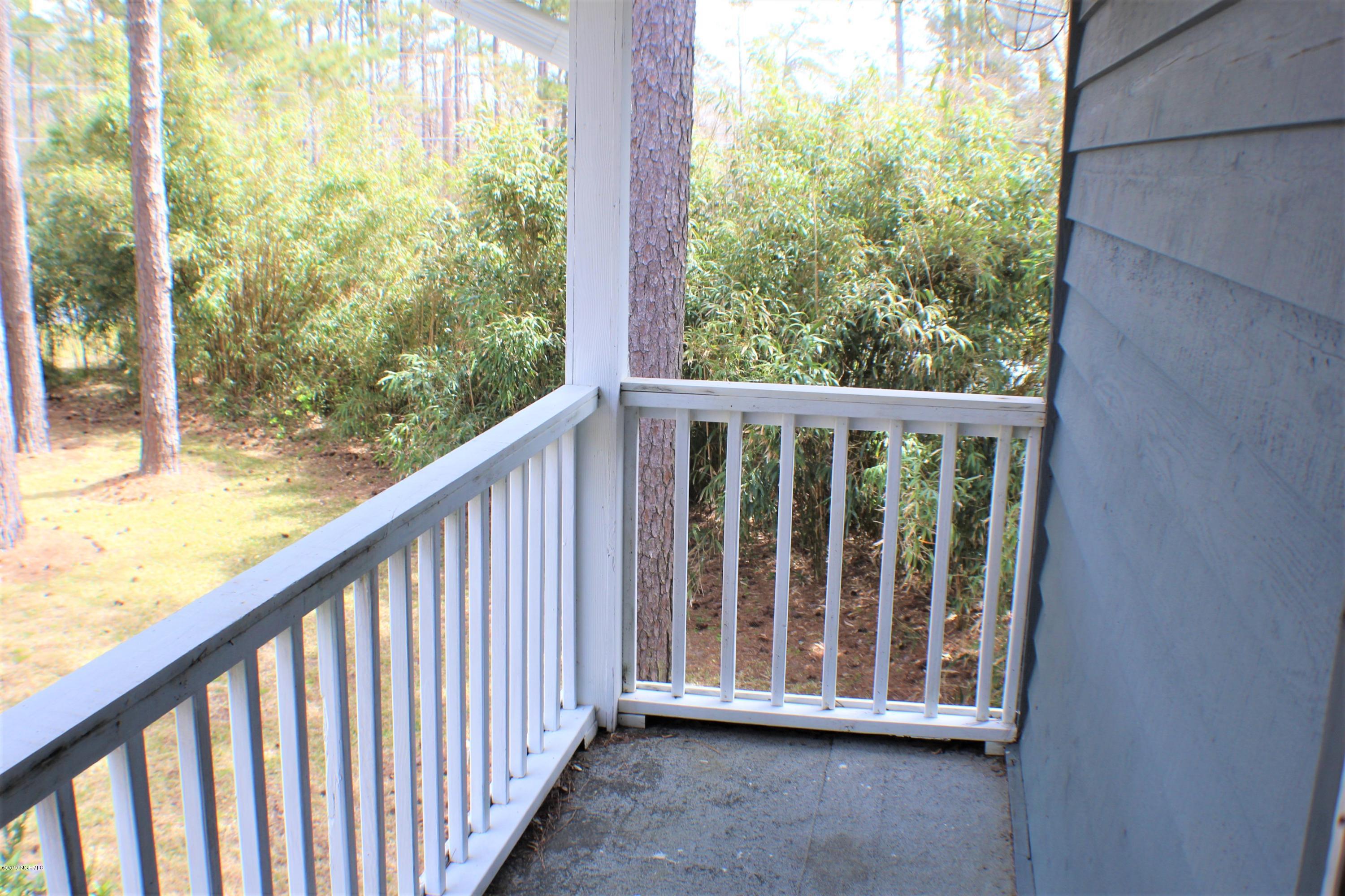 142 Hughes Road Hampstead, NC 28443 - Photo 12 of 22 frontbalcony