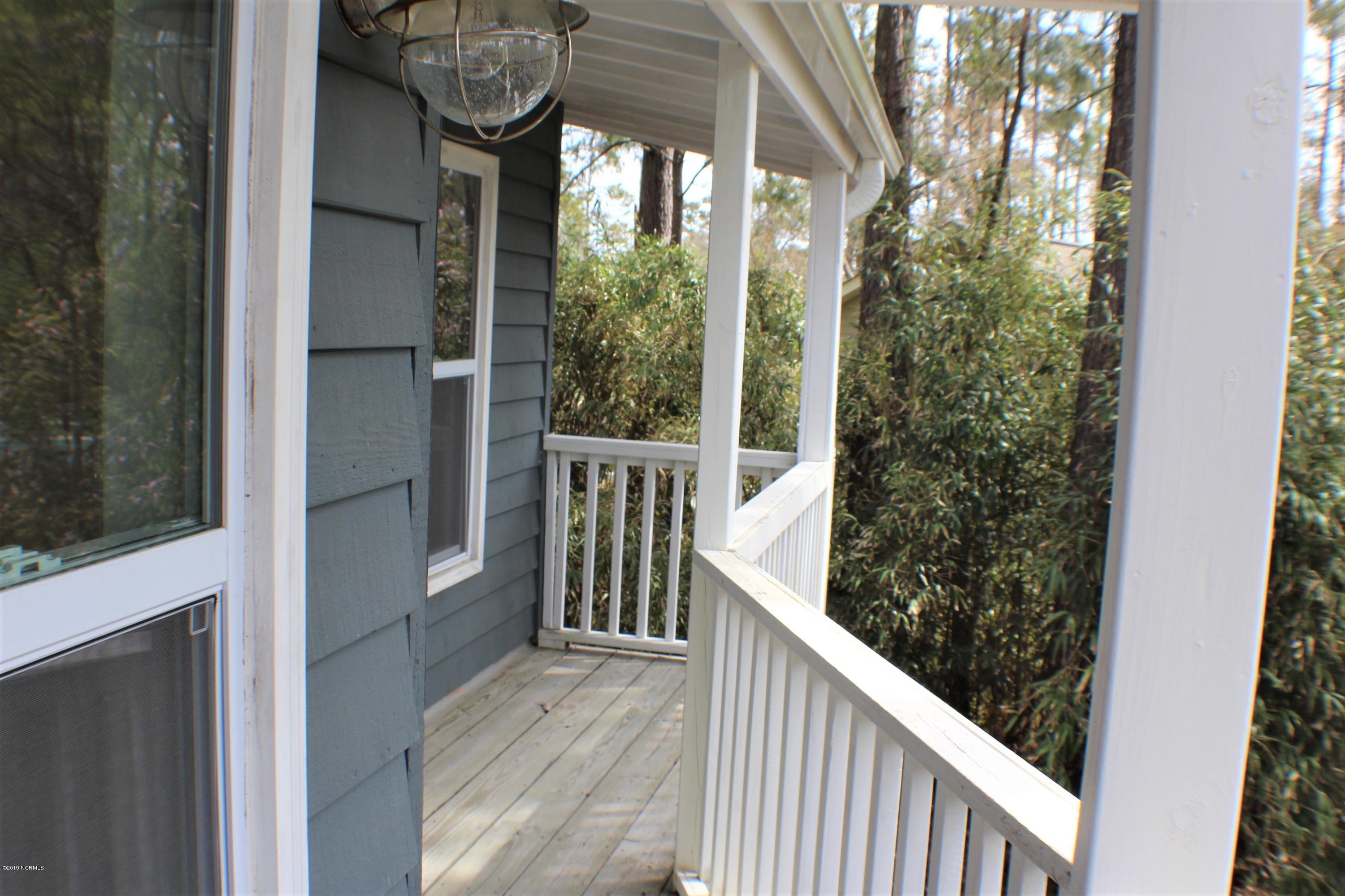 142 Hughes Road Hampstead, NC 28443 - Photo 18 of 22 balconyback1jpg