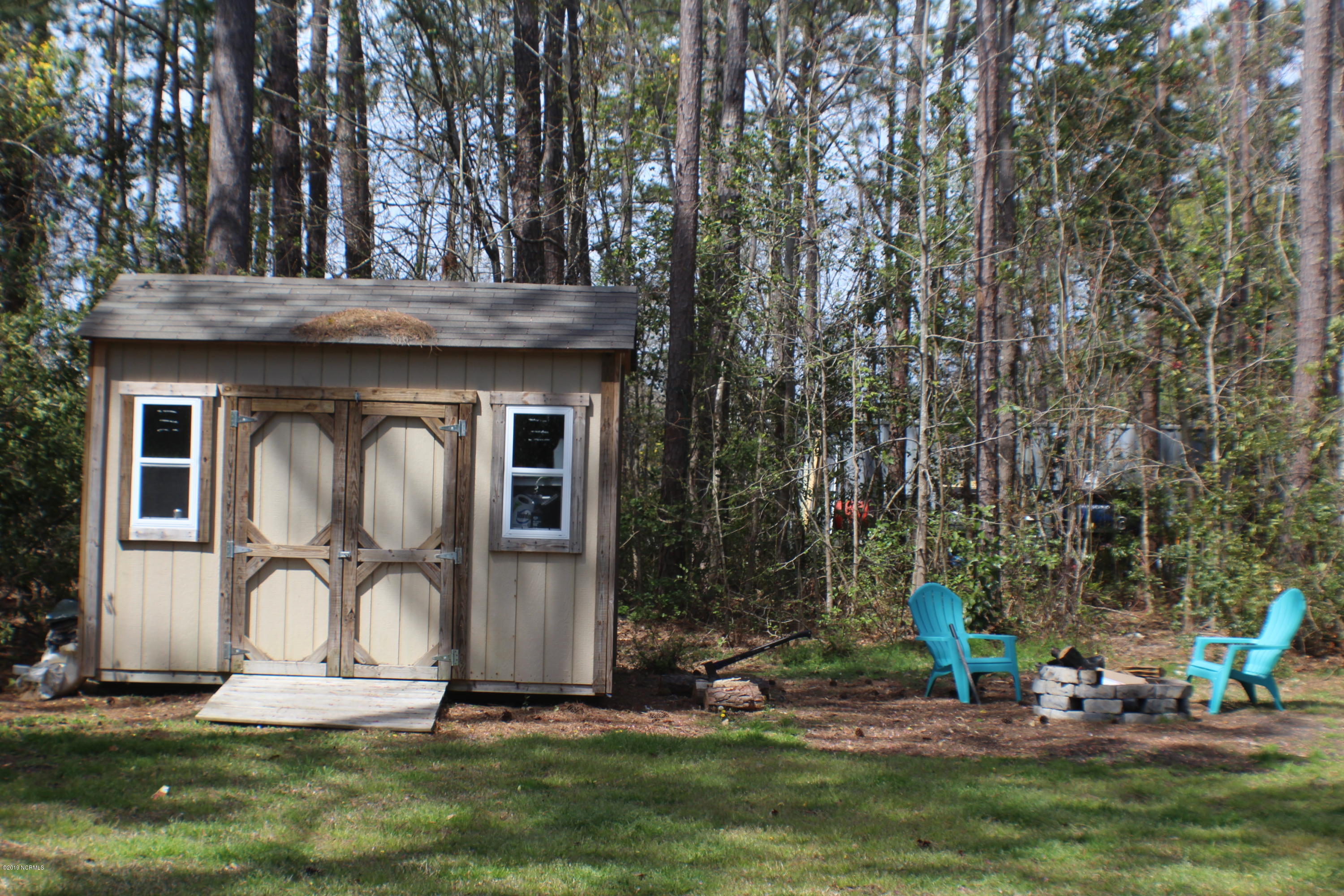 142 Hughes Road Hampstead, NC 28443 - Photo 20 of 22 shed fire