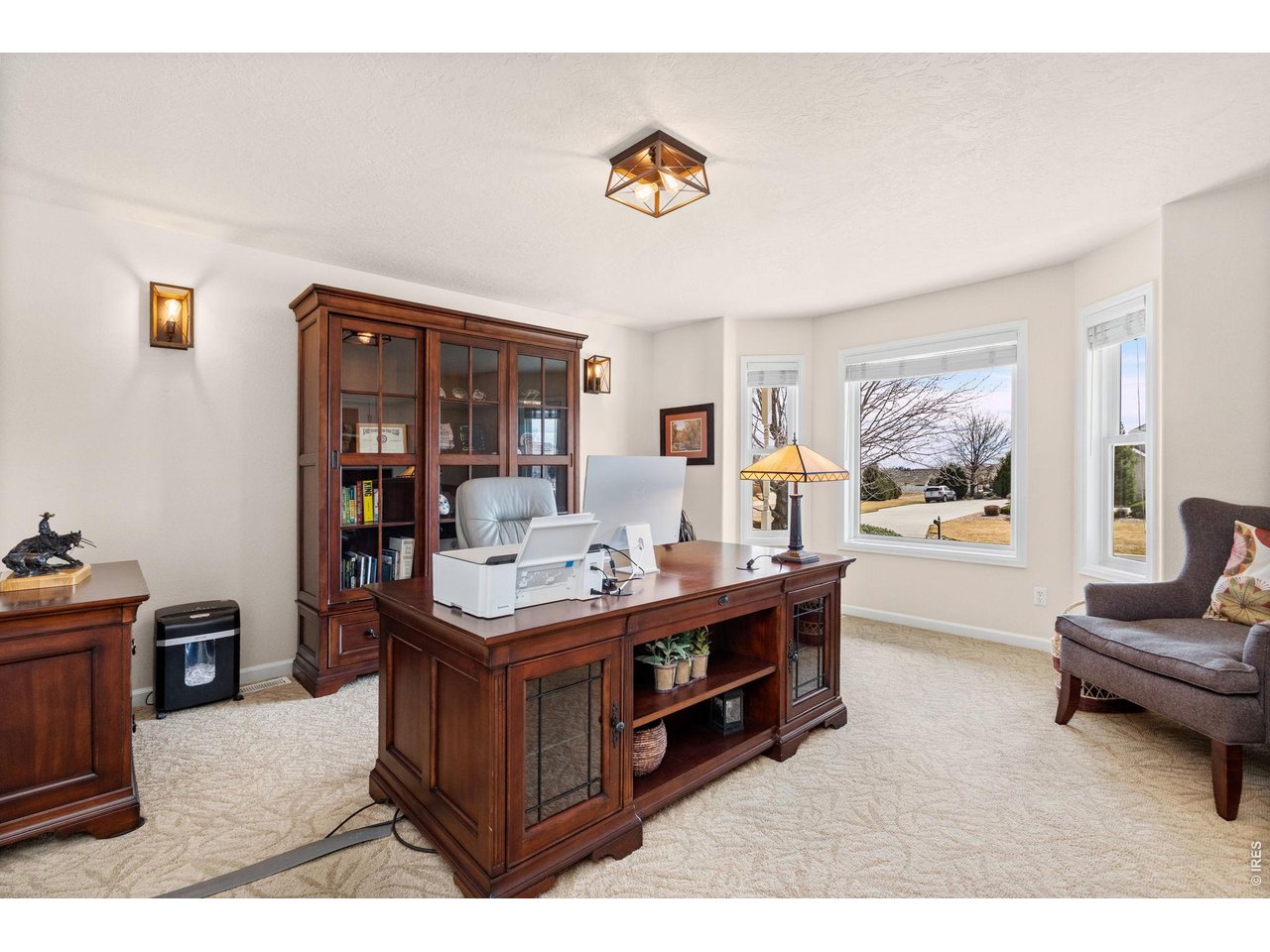 6345 Lesser Drive Greeley, CO 80634 - Photo 13 of 47 Spacious main floor study with bay window and French doors