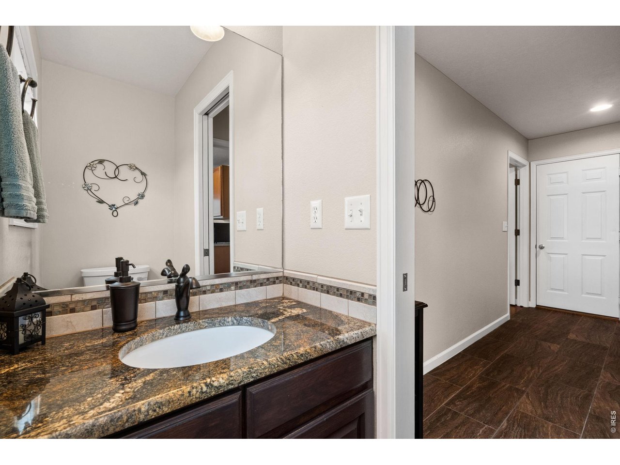 6345 Lesser Drive Greeley, CO 80634 - Photo 25 of 47 Main floor half bath - granite countertop