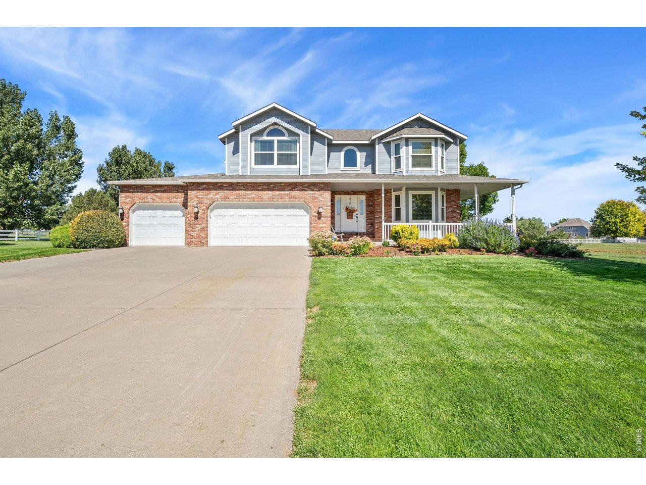 6345 Lesser Drive Greeley, CO 80634 - Photo 3 of 47 Welcome to 6345 Lesser Drive - situated on 2 lush acres!