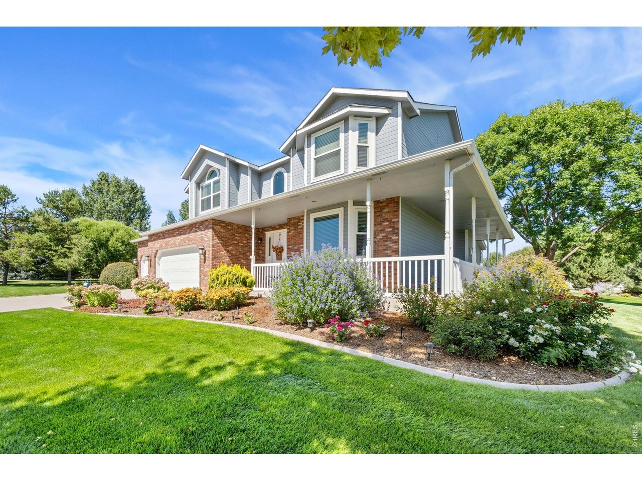 6345 Lesser Drive Greeley, CO 80634 - Photo 5 of 47 Mature, professional landscaping