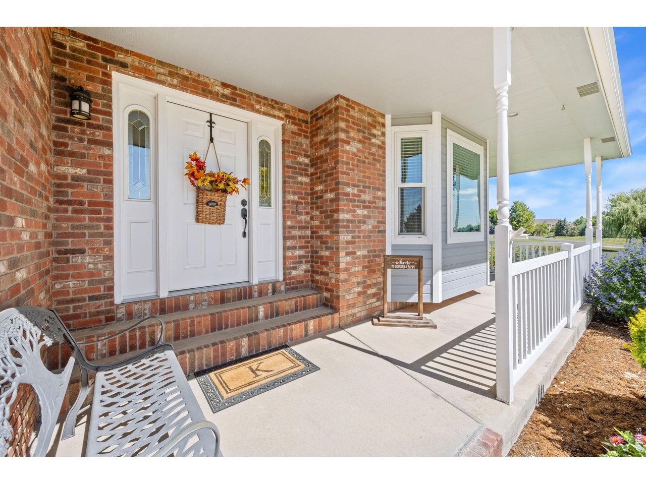 6345 Lesser Drive Greeley, CO 80634 - Photo 6 of 47 Covered front entryway with wrap-around porch