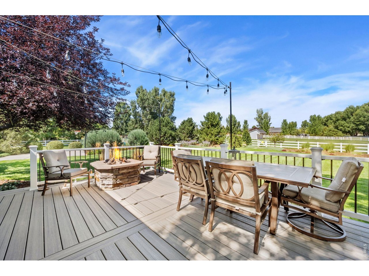 6345 Lesser Drive Greeley, CO 80634 - Photo 8 of 47 Expansive Trex deck with firepit