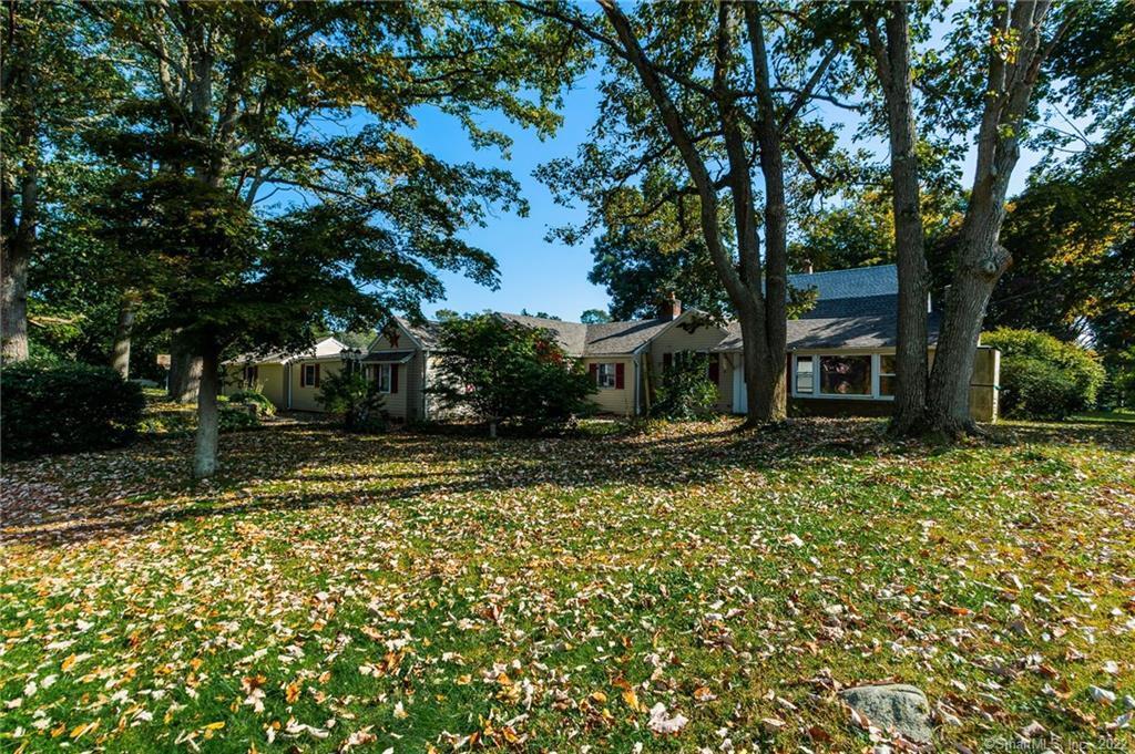 29 Westfield Road Milford, CT 06461 - Photo 1 of 1 a view of a garden with a tree