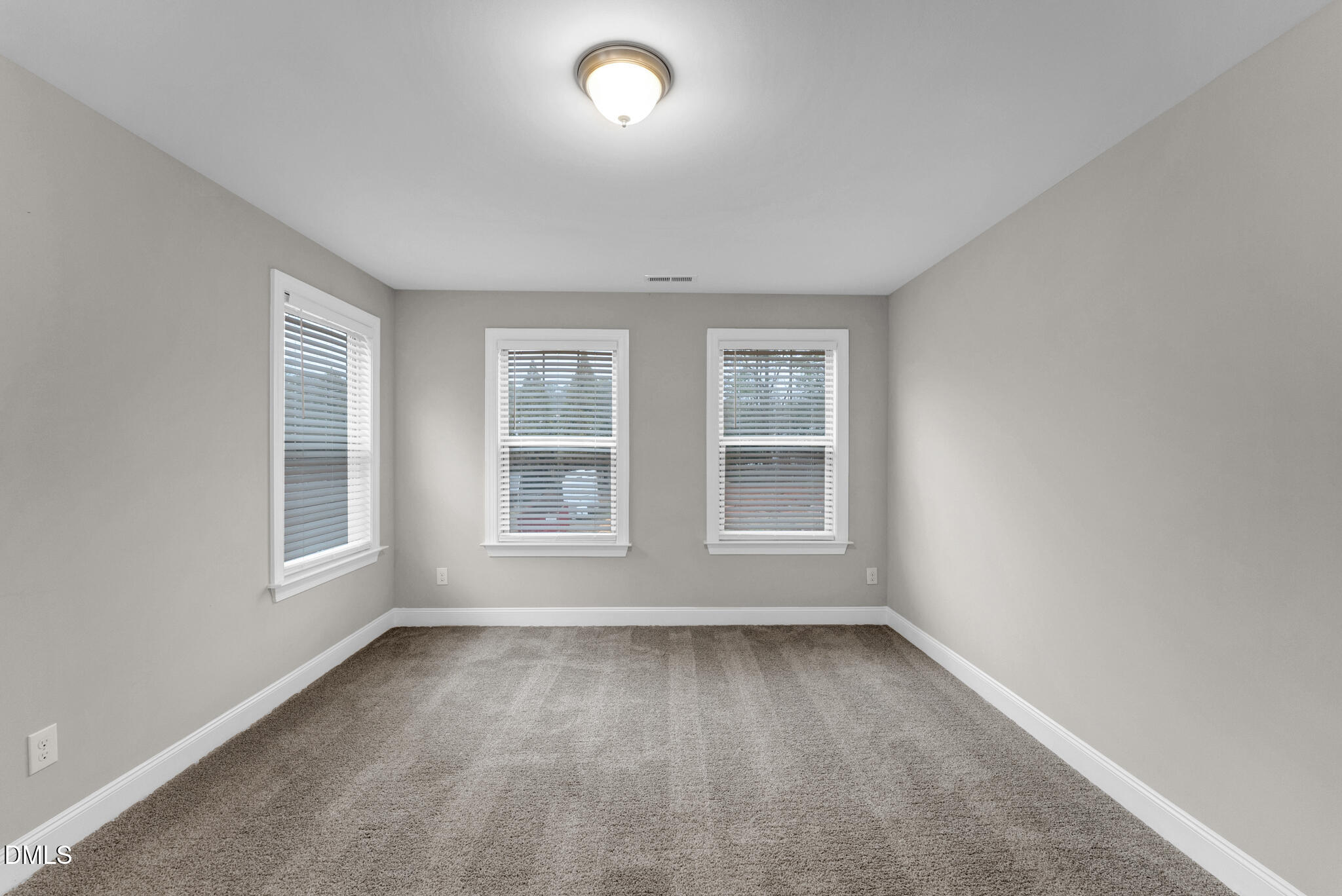 928 Barringer Drive Raleigh, NC 27606 - Photo 27 of 40 an empty room with a window