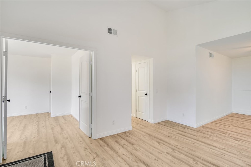 34112 Selva Road, Unit 329 Dana Point, CA 92629 - Photo 15 of 34 a view of empty room with wooden floor