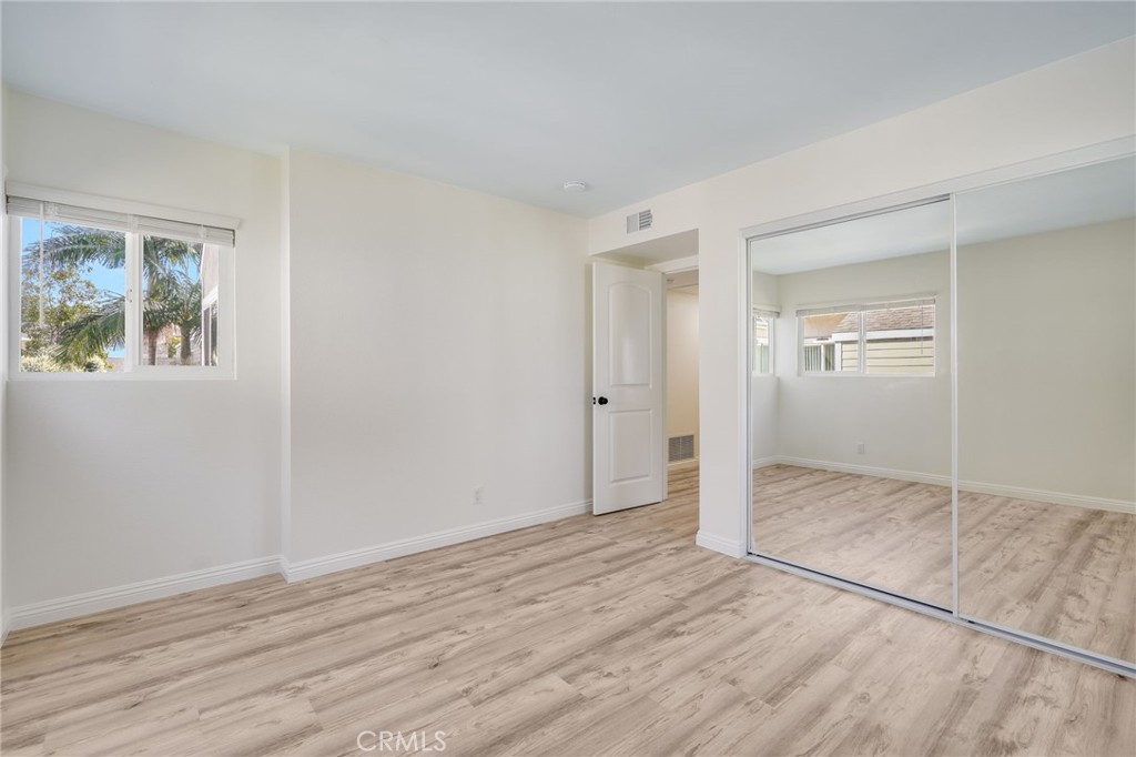 34112 Selva Road, Unit 329 Dana Point, CA 92629 - Photo 26 of 34 wooden floor in an empty room