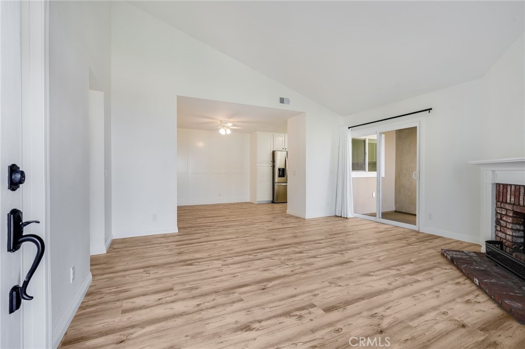 34112 Selva Road, Unit 329 Dana Point, CA 92629 - Photo 4 of 34 a big room with wooden floor and bathroom view