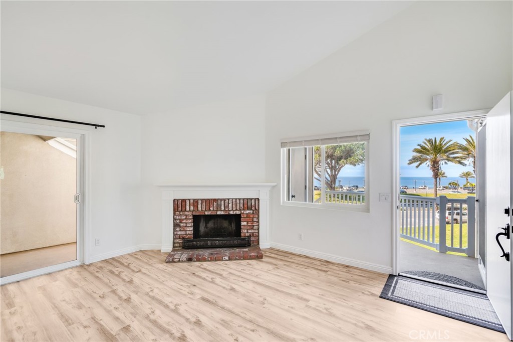 34112 Selva Road, Unit 329 Dana Point, CA 92629 - Photo 7 of 34 a room with bed and a fireplace