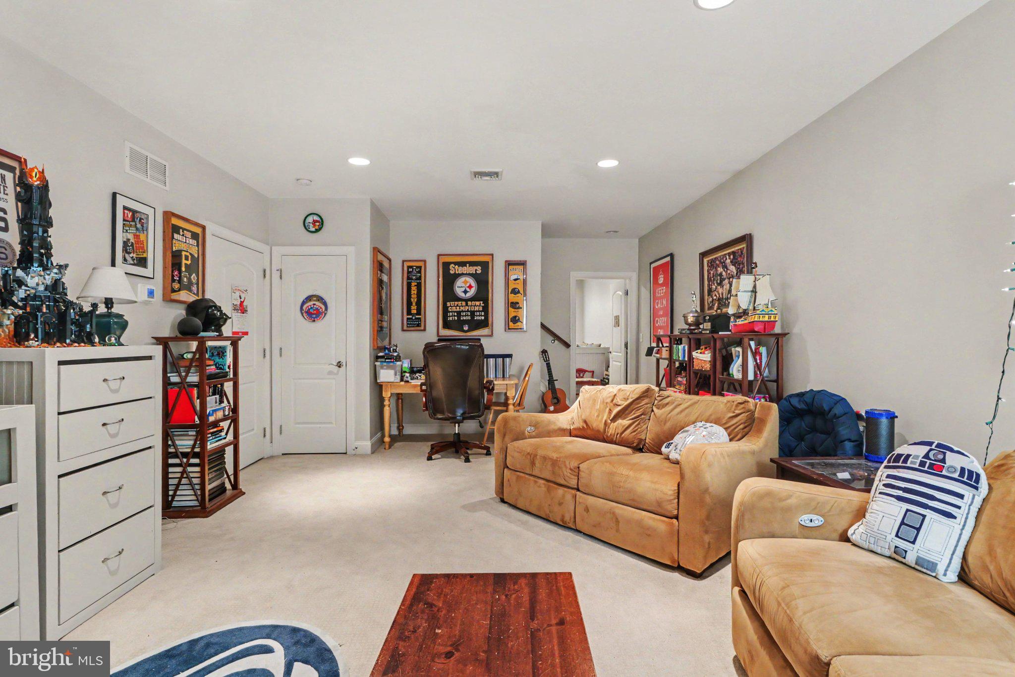 1080 Swatara Road Hershey, PA 17033 - Photo 42 of 59 a living room with furniture and a flat screen tv