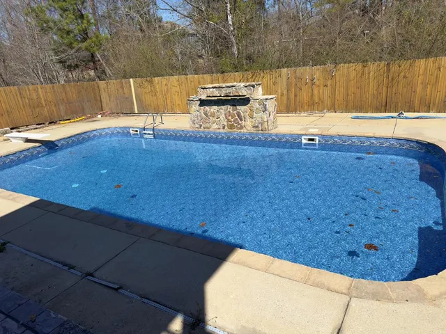 a view of outdoor space and swimming pool
