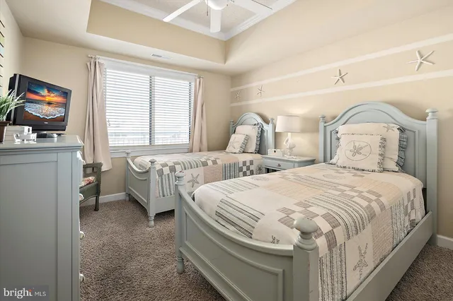 a spacious bathroom with a double vanity sink toilet mirror and shower