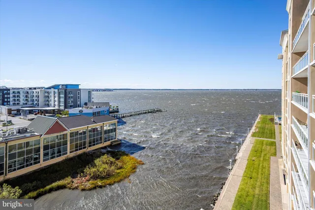 a view of a balcony with chairs