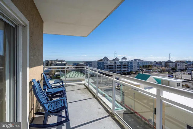 a view of a swimming pool with an ocean
