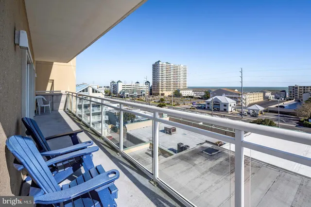 a view of a garden with a house