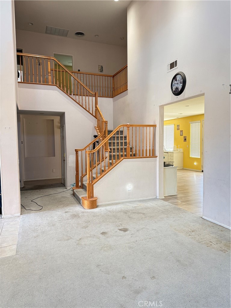 13571 Canyon Crest Way Eastvale, CA 92880 - Photo 3 of 23 a view of an entryway with a house