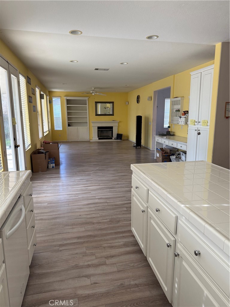 13571 Canyon Crest Way Eastvale, CA 92880 - Photo 8 of 23 a spacious bathroom with stainless steel appliances a sink and a large mirror