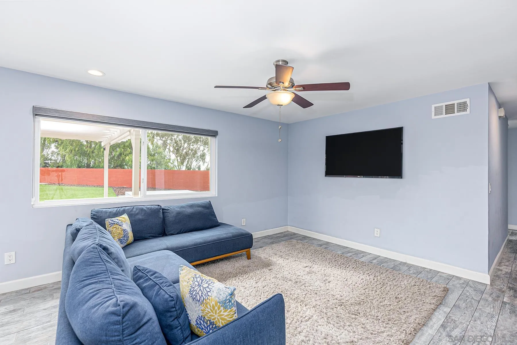 8269 Water View Court Spring Valley, CA 91977 - Photo 3 of 14 a living room with furniture and a flat screen tv