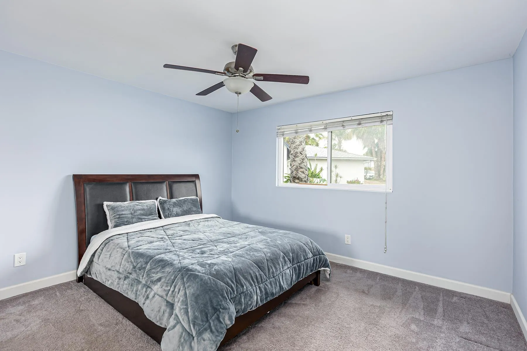 8269 Water View Court Spring Valley, CA 91977 - Photo 8 of 14 a bedroom with a bed and window