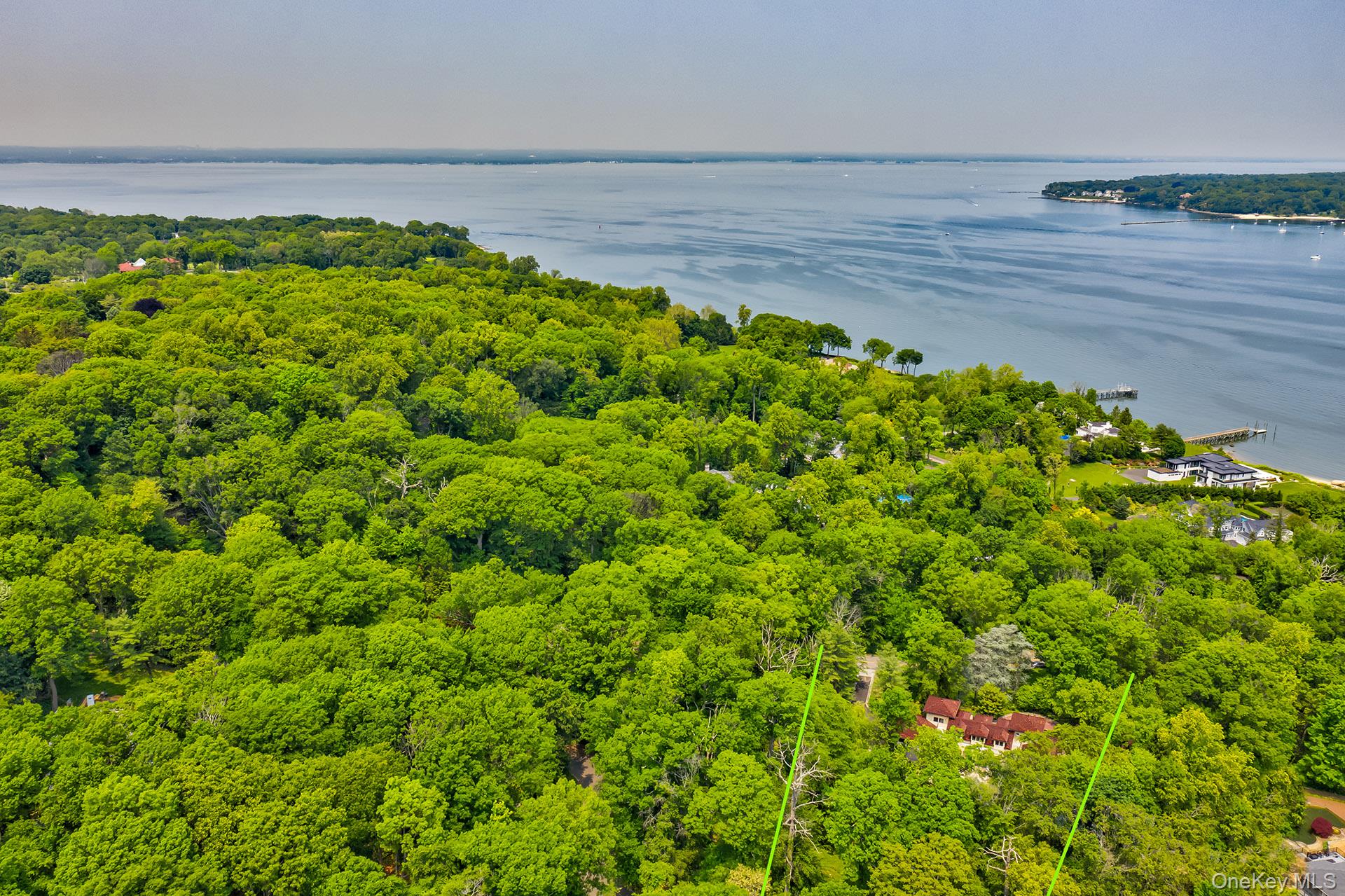 262 Harbor Acres Road Port Washington, NY 11050 - Photo 2 of 27 a view of a lake with an outdoor space