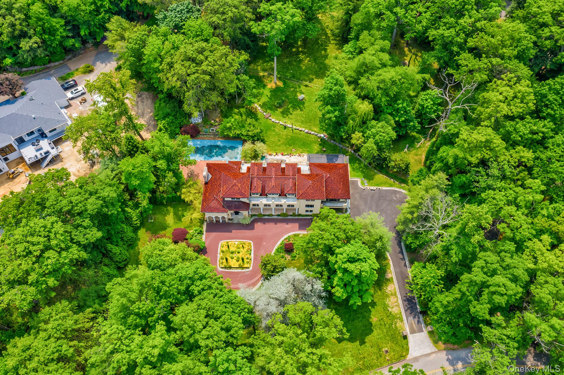 262 Harbor Acres Road Port Washington, NY 11050 - Photo 22 of 27 an aerial view of a house with a yard