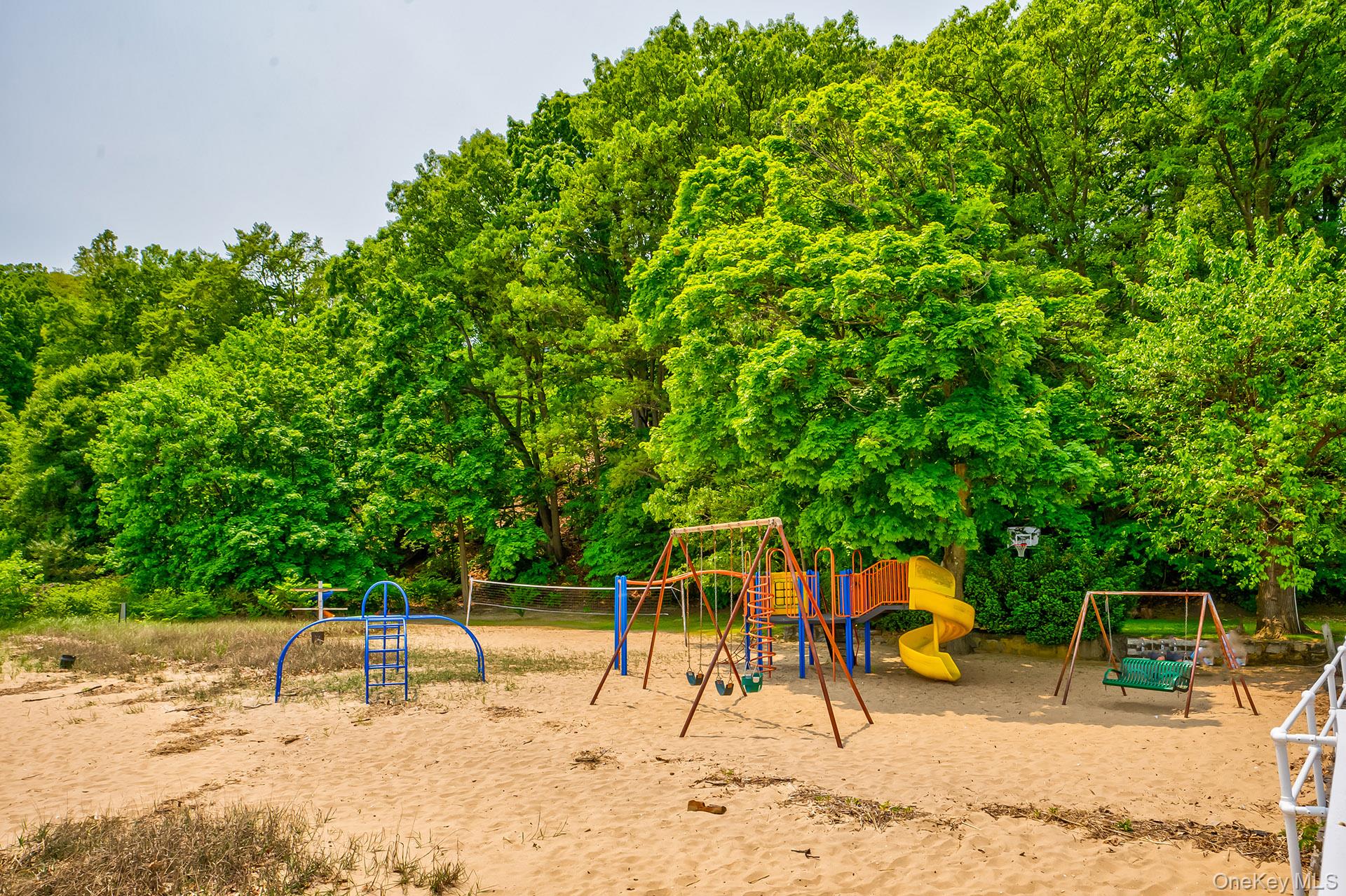 262 Harbor Acres Road Port Washington, NY 11050 - Photo 25 of 27 a view of a park with a slide