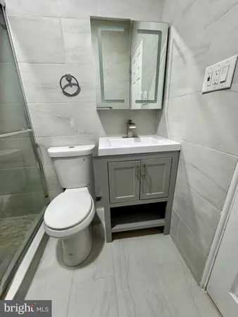 a bathroom with a sink and a toilet