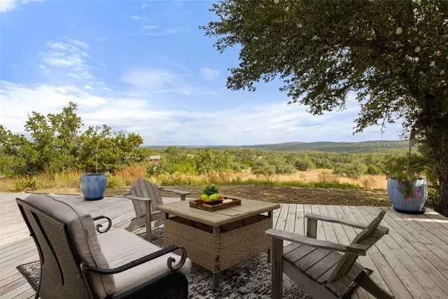 a view of a terrace with furniture