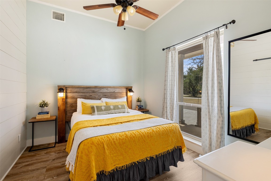 3108 Rolling Hills Road Blanco, TX 78606 - Photo 18 of 39 a bedroom with a bed and a window