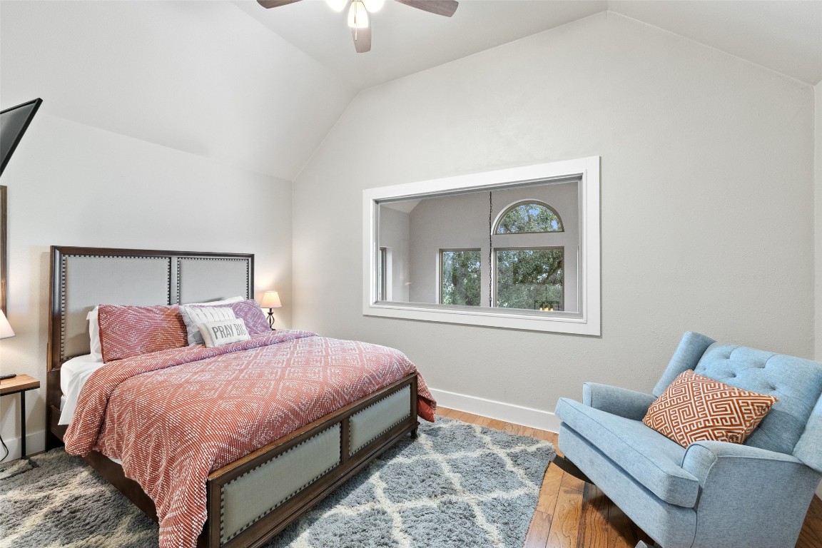 3108 Rolling Hills Road Blanco, TX 78606 - Photo 19 of 39 a bedroom with a bed and window