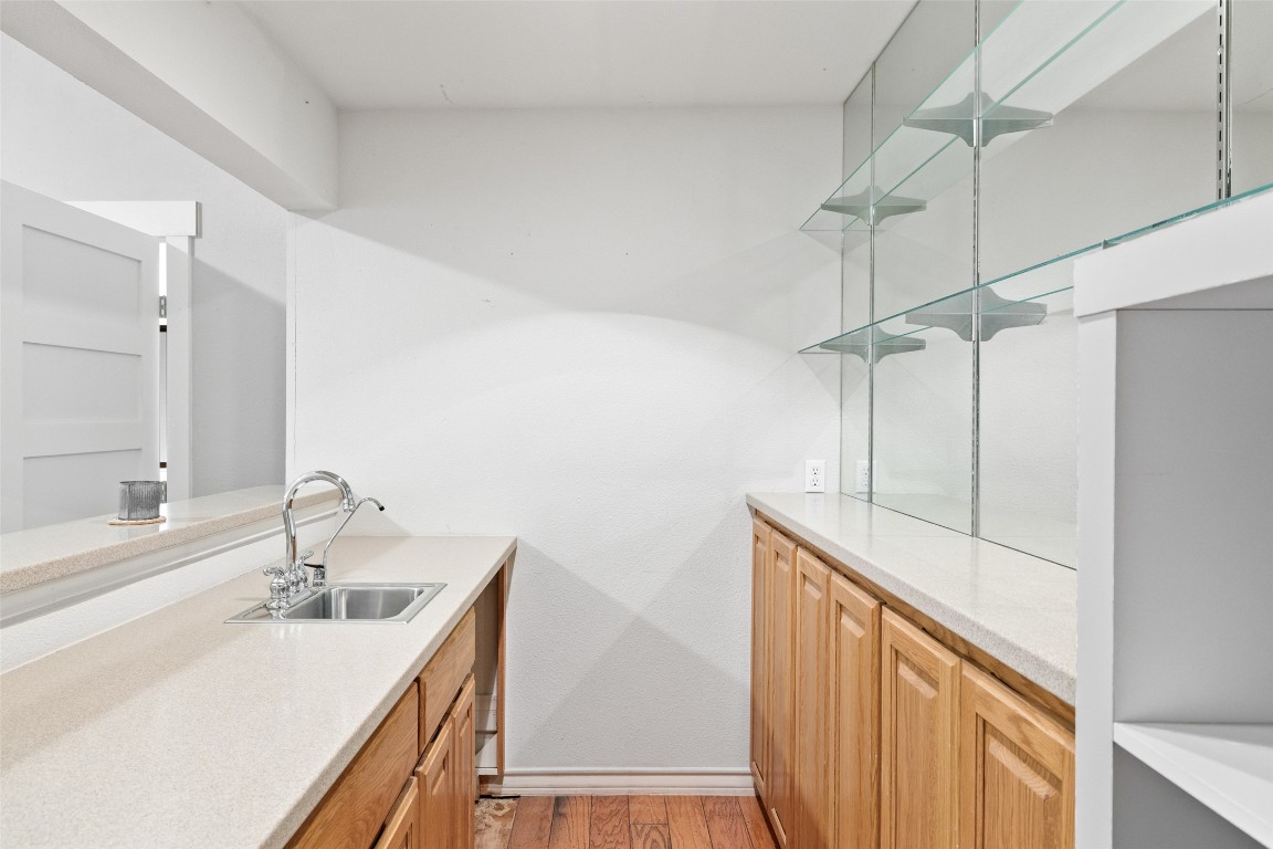 3108 Rolling Hills Road Blanco, TX 78606 - Photo 21 of 39 a bathroom with a sink and a mirror