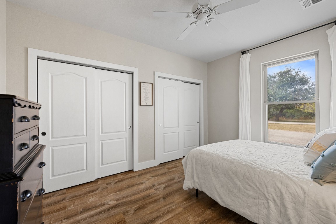 3108 Rolling Hills Road Blanco, TX 78606 - Photo 23 of 39 a bedroom with a bed and a window