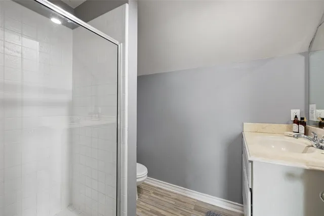 a bathroom with a sink and toilet