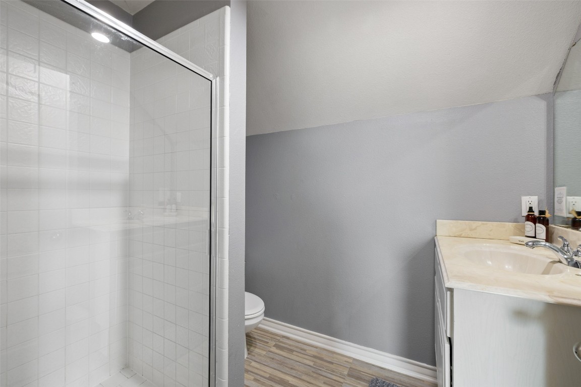 3108 Rolling Hills Road Blanco, TX 78606 - Photo 28 of 39 a bathroom with a sink and toilet