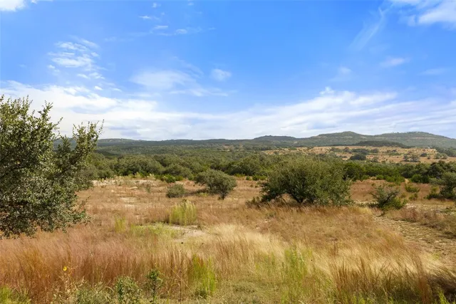 a view of lake with mountain